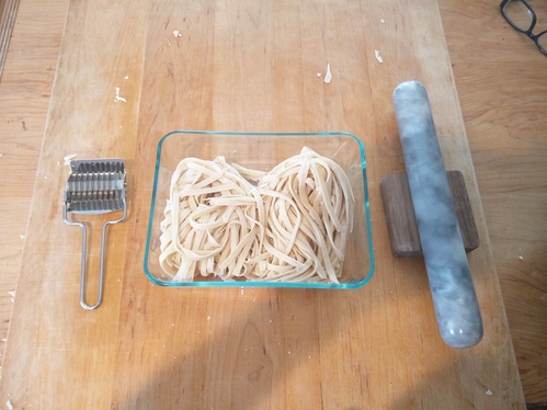 Freshly cut pasta and her tools.